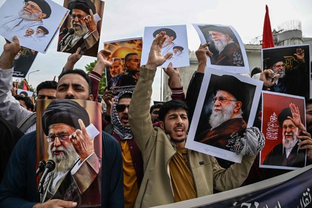 Shia Muslims holding portraits of Iran's slain supreme leader Ayatollah Ali Khamenei shout slogans during an anti US-Israel protest in Islamabad on March 6, 2026. The United States and Israel started striking Iran on February 28, killing Iran's supreme leader and top military leaders, and prompting authorities to retaliate with strikes on Israel and across the Gulf. (Photo by Aamir QURESHI / AFP)