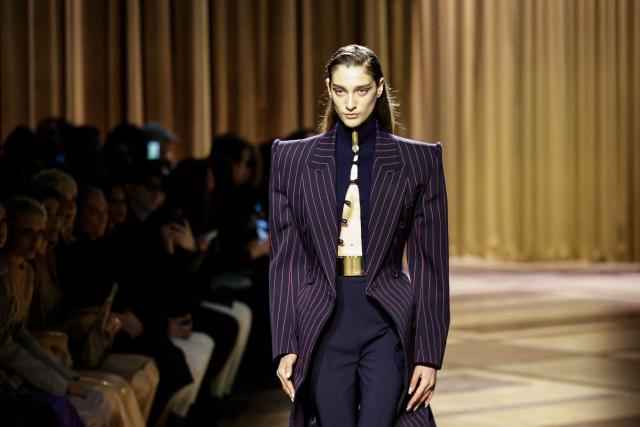 A model presents a creation for Mugler for the Women's Ready to Wear Fall/Winter 2026-2027 collection fashion show as part of the Paris Women Fashion Week, in Paris, on March 6, 2026. (Photo by STEPHANE DE SAKUTIN / AFP)