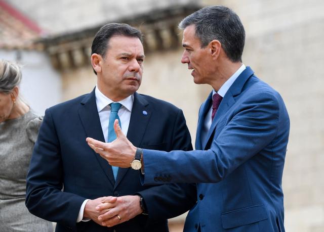 Spain's Prime Minister Pedro Sanchez (R) gestures to Portugal's Prime Minister Luis Montenegro at the start of a Spain-Portugal summit held at the La Rabida Monastery in Palos de la Frontera on March 6, 2026. (Photo by CRISTINA QUICLER / AFP)