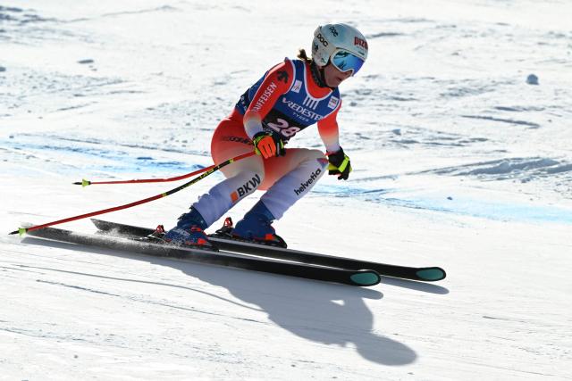 Switzerland's Janine Schmitt competes in the Women's Downhill race of the FIS Ski World Cup at the La Volata slope in the Passo San Pellegrino ski area, Val di Fassa, Italy on March 6, 2026. The downhill race is a recovery race that was originally scheduled in Crans Montana, Switzerland. (Photo by Andreas SOLARO / AFP)