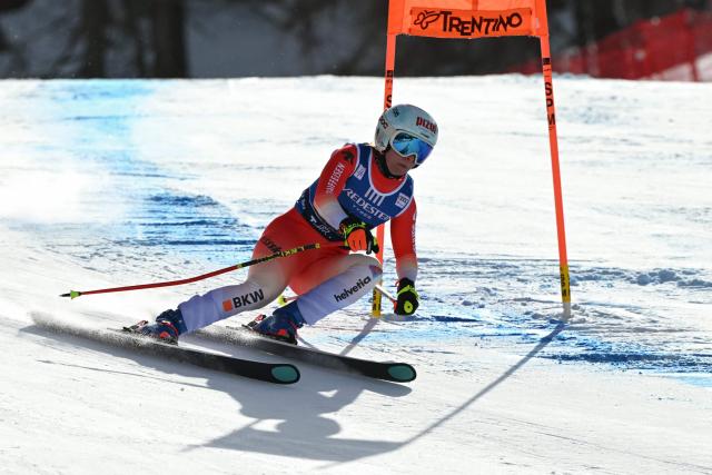 Switzerland's Janine Schmitt competes in the Women's Downhill race of the FIS Ski World Cup at the La Volata slope in the Passo San Pellegrino ski area, Val di Fassa, Italy on March 6, 2026. The downhill race is a recovery race that was originally scheduled in Crans Montana, Switzerland. (Photo by Andreas SOLARO / AFP)