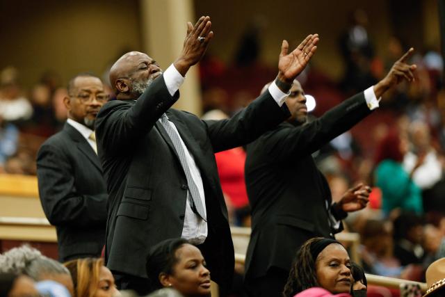 People attend a public memorial service to celebrate the life of civil rights activist Reverend Jesse Jackson in Chicago, Illinois, on March 6, 2026. Veteran US civil rights activist Reverend Jesse Jackson, one of the nation's most influential Black voices, died peacefully on February 17, 2026 at the age of 84. Jackson, a Baptist minister, had been a civil rights leader since the 1960s, when he marched with Martin Luther King Jr. and helped fundraise for the cause. (Photo by Kamil Krzaczynski / AFP)