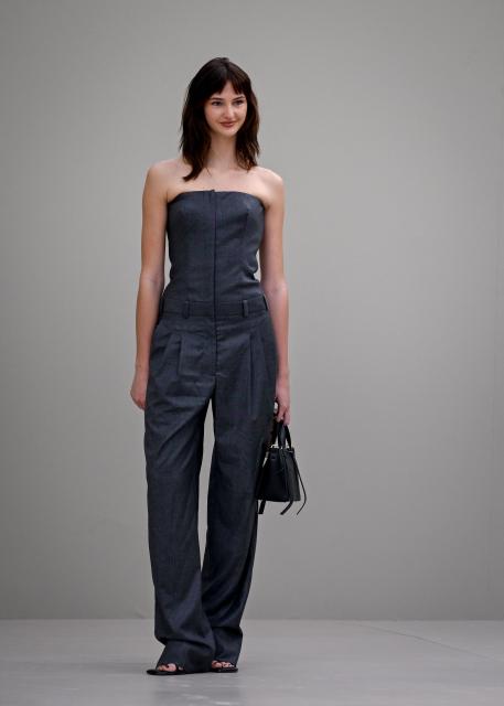 British model Mia Regan arrives ahead of the Givenchy Women's Ready to Wear Fall/Winter 2026-2027 collection fashion show as part of the Paris Women Fashion Week, in Paris, on March 6, 2026. (Photo by Julie SEBADELHA / AFP)