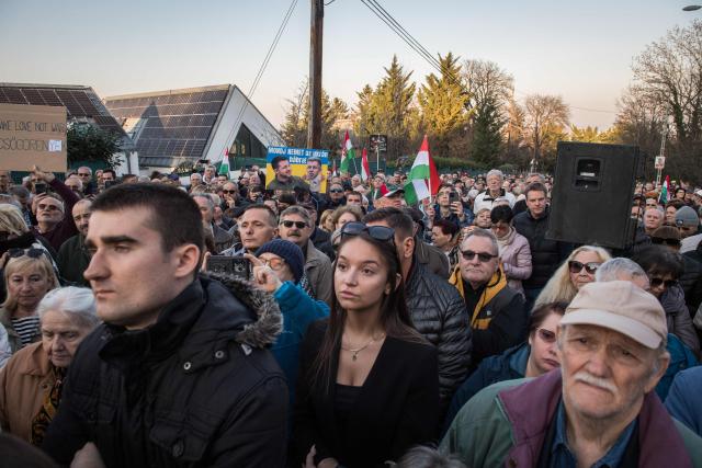 Demonstrators listen to Hungarian Minister of Economy and Foreign Affairs as he speaks during a demonstration in support of the Hungarian government against Ukraine's President Zelensky in front of the Ukrainian Embassy in Budapest, on March 6, 2026. Hungary will expel seven detained Ukrainians, the government said on March 6, as Hungarian Prime Minister Orban and Ukrainian President Zelensky traded threats in a row over stalled Russian oil supplies. Kyiv accused Budapest of having kidnapped seven of its citizens, as Orban said he would use "every means" to pressure Ukraine over the Russian oil. A day earlier, Zelensky appeared to have issued a direct threat against Orban, saying Ukraine's armed forces would "talk to him in their own language" -- a statement condemned by Hungary and the EU. Hungary and Slovakia say Ukraine is deliberately delaying reopening a key pipeline pumping Russian oil to the two landlocked EU member states, which Kyiv says was damaged by Russian strikes in January. (Photo by Ferenc ISZA / AFP)