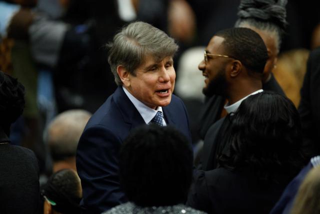 Former Illinois Governor Rod Blagojevic greets attendees at the Public Homecoming and celebration of life for civil rights activist Reverend Jesse Jackson in Chicago, Illinois, on March 6, 2026. Veteran US civil rights activist Reverend Jesse Jackson, one of the nation's most influential Black voices, died peacefully on February 17, 2026 at the age of 84. Jackson, a Baptist minister, had been a civil rights leader since the 1960s, when he marched with Martin Luther King Jr. and helped fundraise for the cause. (Photo by Kamil Krzaczynski / AFP)