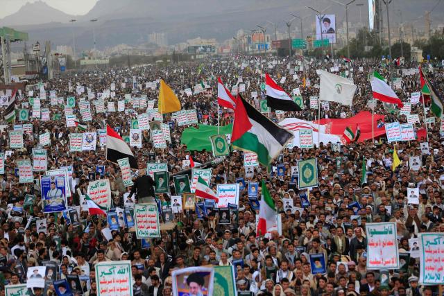 Houthis rally in solidarity with Iran and Lebanon, amid the US-Israeli conflict with Iran, in the Yemeni capital Sanaa on March 6, 2026. The US president on March 6, demanded Iran's "unconditional surrender" as the only acceptable outcome to end hostilities, while promising to help rebuild the country's economy if Tehran complied. (Photo by Mohammed HUWAIS / AFP)