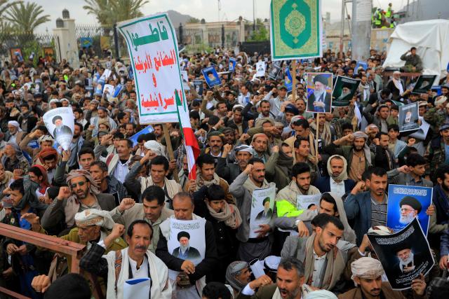Houthis rally in solidarity with Iran and Lebanon, amid the US-Israeli conflict with Iran, in the Yemeni capital Sanaa on March 6, 2026. The US president on March 6, demanded Iran's "unconditional surrender" as the only acceptable outcome to end hostilities, while promising to help rebuild the country's economy if Tehran complied. (Photo by Mohammed HUWAIS / AFP)