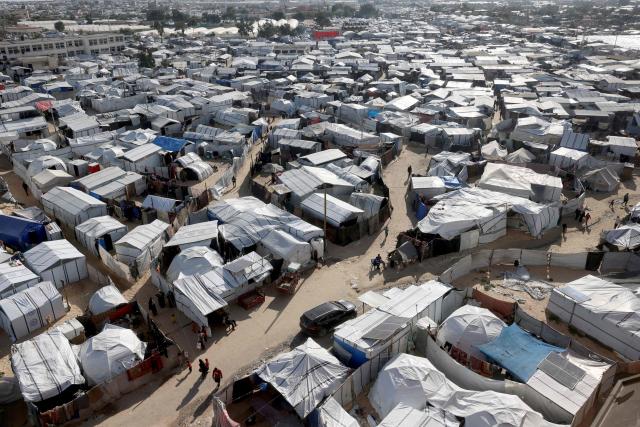 Hundreds of tents are set up to house displaced Palestinians who lost their homes and businesses during Israeli military bombardment of the Gaza Strip, in Khan Yunis, in the south of the Gaza Strip on March 6, 2026. The majority of Gaza's 2.4 million people have been displaced, often multiple times, by the war that began with Hamas's attack on southern Israel on October 7, 2023. With displaced families living in tented camps, with serious concerns raised over their living conditions. (Photo by Bashar Taleb / AFP)