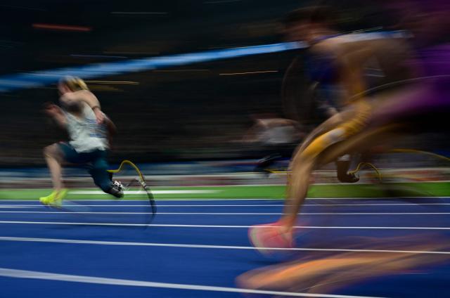 Athletes compete during the men's 60m para final event of the ISTAF indoor Athletics Meeting 2026 in Berlin on March 6, 2026. (Photo by Tobias SCHWARZ / AFP)
