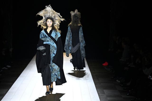 Models present a creation by Yohji Yamamoto for the Women's Ready to Wear Fall/Winter 2026-2027 collection fashion show as part of the Paris Women Fashion Week, in Paris, on March 6, 2026. (Photo by JULIEN DE ROSA / AFP)