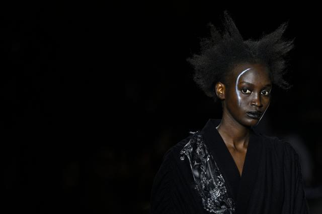 A model presents a creation by Yohji Yamamoto for the Women's Ready to Wear Fall/Winter 2026-2027 collection fashion show as part of the Paris Women Fashion Week, in Paris, on March 6, 2026. (Photo by JULIEN DE ROSA / AFP)