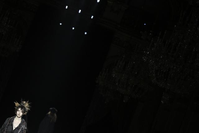 A model presents a creation by Yohji Yamamoto for the Women's Ready to Wear Fall/Winter 2026-2027 collection fashion show as part of the Paris Women Fashion Week, in Paris, on March 6, 2026. (Photo by JULIEN DE ROSA / AFP)