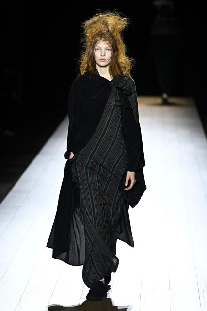 A model presents a creation by Yohji Yamamoto for the Women's Ready to Wear Fall/Winter 2026-2027 collection fashion show as part of the Paris Women Fashion Week, in Paris, on March 6, 2026. (Photo by JULIEN DE ROSA / AFP)