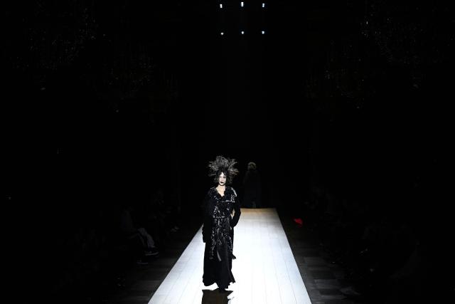 A model presents a creation by Yohji Yamamoto for the Women's Ready to Wear Fall/Winter 2026-2027 collection fashion show as part of the Paris Women Fashion Week, in Paris, on March 6, 2026. (Photo by JULIEN DE ROSA / AFP)