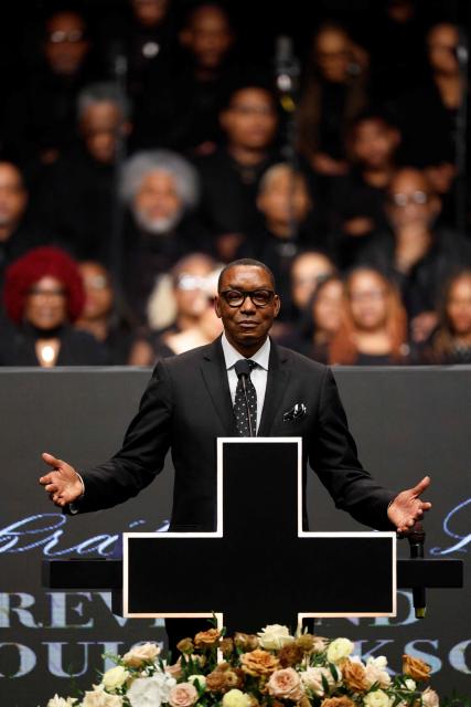 Former basketball player Isaiah Thomas speaks at a public memorial service to celebrate the life of civil rights activist Reverend Jesse Jackson in Chicago, Illinois, on March 6, 2026. Veteran US civil rights activist Reverend Jesse Jackson, one of the nation's most influential Black voices, died peacefully on February 17, 2026 at the age of 84. Jackson, a Baptist minister, had been a civil rights leader since the 1960s, when he marched with Martin Luther King Jr. and helped fundraise for the cause. (Photo by Kamil Krzaczynski / AFP)