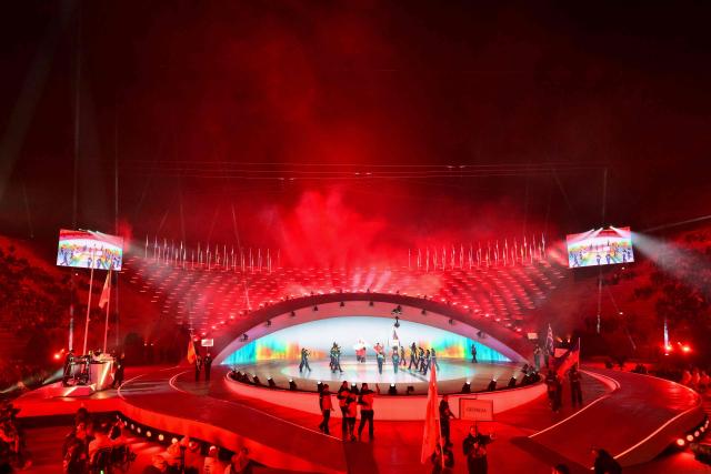 Athletes take part in the delegation parade during the Milano Cortina 2026 Winter Paralympic Games opening ceremony at Arena di Verona in Verona on March 6, 2026. (Photo by Stefano RELLANDINI / AFP)