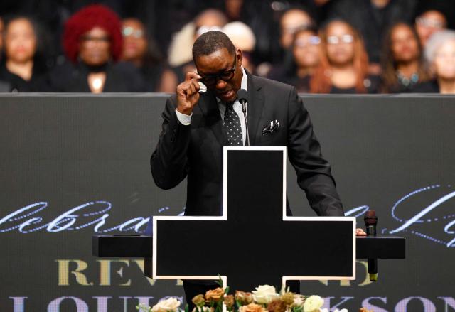 Former basketball player Isaiah Thomas speaks at a public memorial service to celebrate the life of civil rights activist Reverend Jesse Jackson in Chicago, Illinois, on March 6, 2026. Veteran US civil rights activist Reverend Jesse Jackson, one of the nation's most influential Black voices, died peacefully on February 17, 2026 at the age of 84. Jackson, a Baptist minister, had been a civil rights leader since the 1960s, when he marched with Martin Luther King Jr. and helped fundraise for the cause. (Photo by Kamil Krzaczynski / AFP)