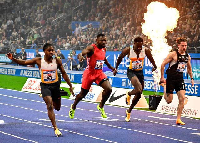 (L_R) Britain's Jeremiah Azu, Cameroon's Emmanual Eseme, Germany's Owen Ansah and Germany's Kevin Kranz compete during the men's 60m event of the ISTAF indoor Athletics Meeting 2026 in Berlin on March 6, 2026. (Photo by Tobias SCHWARZ / AFP)