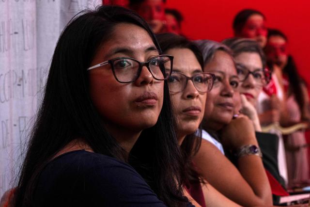 Marisela (L) and Marcia Monzon, daughters of Celia Ramos, a woman who was victim of a forced sterilization, are seen during a performance at the DEMUS Reproductive Rights Center in Lima on March 6, 2026. The daughters of a peasant woman who died in 1997 from a forced sterilization in Peru emphasized that the Inter-American Court of Human Rights "did justice" after the ruling that recognizes the responsibility of the authorities for a practice that affected some 300,000 women in the decade of the 1990s. (Photo by Ernesto BENAVIDES / AFP)