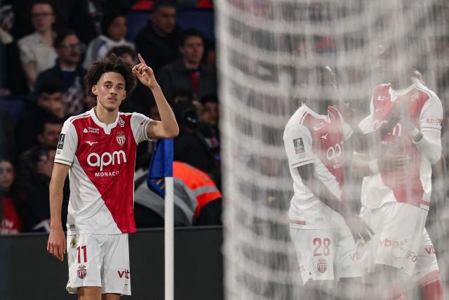 Monaco's French midfielder #11 Maghnes Akliouche celebrates   after scoring the opening goal during the French L1 football match between Paris Saint-Germain (PSG) and AS Monaco at the Parc des Princes stadium in Paris on March 6, 2026. (Photo by FRANCK FIFE / AFP)