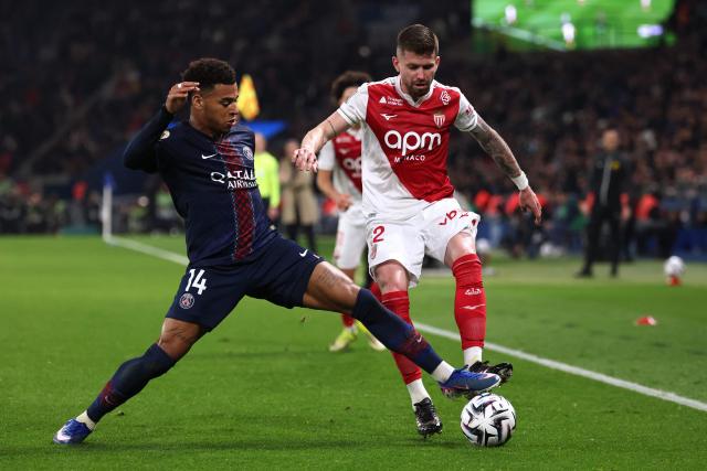 Paris Saint-Germain's French midfielder #14 Desire Doue (L) fights for the ball with Monaco's Brazilian midfielder #12 Caio Henrique  during the French L1 football match between Paris Saint-Germain (PSG) and AS Monaco at the Parc des Princes stadium in Paris on March 6, 2026. (Photo by FRANCK FIFE / AFP)