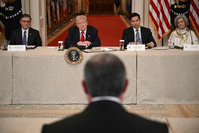 (From L) US Speaker of the House Mike Johnson, US President Donald Trump, US Secretary of State Marco Rubio and White House Chief of Staff Susie Wiles listen during a roundtable to "save college sports" in the East Room of the White House in Washington, DC, on March 6, 2026. (Photo by Brendan SMIALOWSKI / AFP)