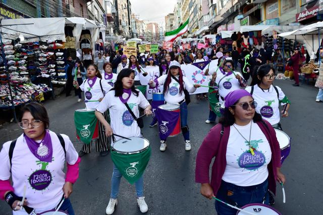 Feminist groups beat the drums during a march against government on the eve of International Women's Day in La Paz on March 6, 2026. The International Women's Rights Day will fall on March 8, 2026. (Photo by Jorge BERNAL / AFP)