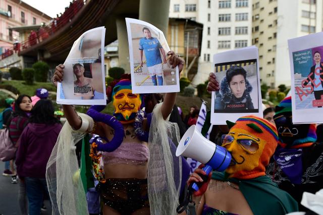 Feminist groups perform during a march against government on the eve of International Women's Day in La Paz on March 6, 2026. The International Women's Rights Day will fall on March 8, 2026. (Photo by Jorge BERNAL / AFP)