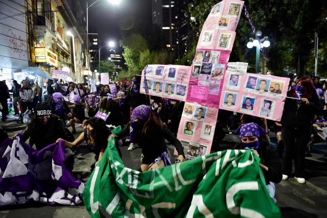 Feminist groups perform during a march against government on the eve of International Women's Day in La Paz on March 6, 2026. The International Women's Rights Day will fall on March 8, 2026. (Photo by Jorge BERNAL / AFP)