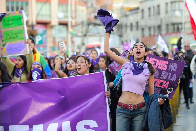 Feminist groups shout slogans during a march against the government on the eve of International Women's Day in La Paz on March 6, 2026. The International Women's Rights Day will fall on March 8, 2026. (Photo by Jorge BERNAL / AFP)