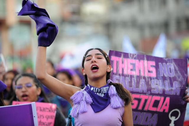 A feminist group member shouts slogans during a march against the government on the eve of International Women's Day in La Paz on March 6, 2026. The International Women's Rights Day will fall on March 8, 2026. (Photo by Jorge BERNAL / AFP)