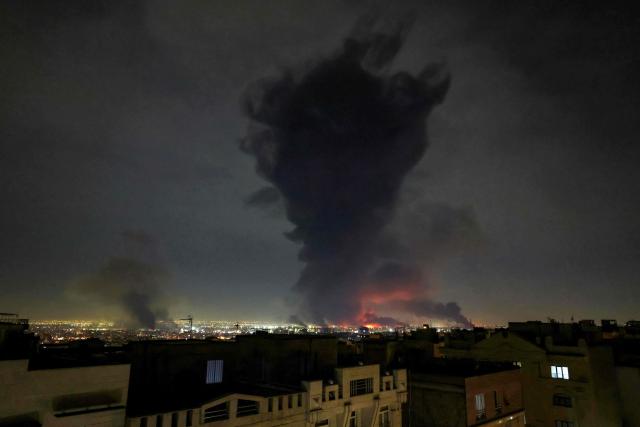 Smoke rises from the site of airstrikes at Mehrabad International Airport in Tehran on March 7, 2026. Israel said on March 7 it had launched "broad-scale" strikes on targets in Tehran, as the Iranian state broadcaster reported an explosion in the western part of the city. (Photo by ATTA KENARE / AFP)