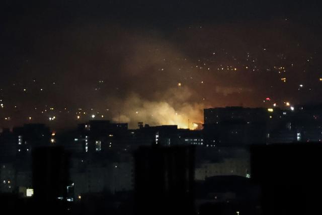 Smoke and fire rise from the site of airstrikes at Mehrabad International Airport in Tehran on March 7, 2026. Israel said on March 7 it had launched "broad-scale" strikes on targets in Tehran, as the Iranian state broadcaster reported an explosion in the western part of the city. (Photo by ATTA KENARE / AFP)