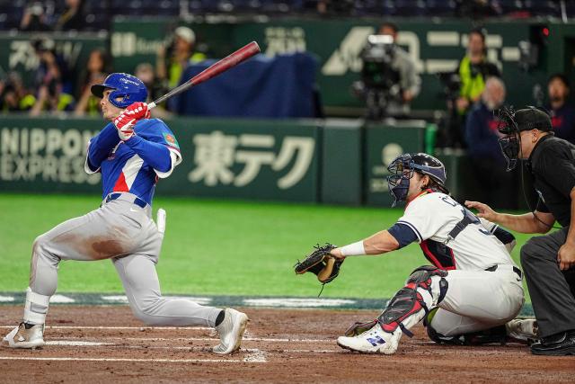 Taiwan's Stuart Fairchild hits a grand slam home run during the World Baseball Classic (WBC) Pool C game between Taiwan and Czech Republic at the Tokyo Dome in Tokyo on March 7, 2026. (Photo by Yuichi YAMAZAKI / AFP)