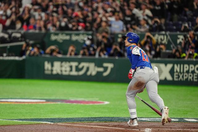 Taiwan's Stuart Fairchild hits a grand slam home run during the World Baseball Classic (WBC) Pool C game between Taiwan and Czech Republic at the Tokyo Dome in Tokyo on March 7, 2026. (Photo by Yuichi YAMAZAKI / AFP)