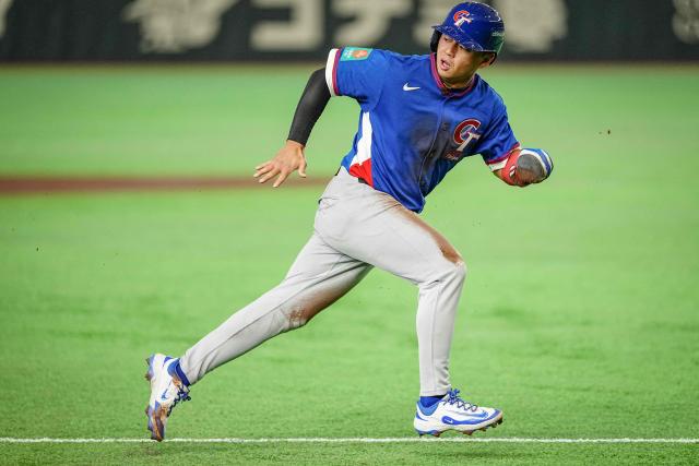 Taiwan's Tsung-Che Cheng runs to home base during the World Baseball Classic (WBC) Pool C game between Taiwan and Czech Republic at the Tokyo Dome in Tokyo on March 7, 2026. (Photo by Yuichi YAMAZAKI / AFP)