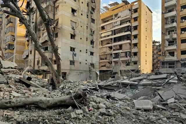 Rubble of destroyed buildings is seen at the site of an Israeli airstrike that targeted Haret Hreik neighbourhood in Beirut's southern suburbs, on March 7, 2026. Lebanese official media reported on March 7 that clashes had erupted as Israeli forces attempted a landing operation along the Lebanon-Syria border, with militant group Hezbollah saying its fighters were involved. There was no immediate comment from the Israeli military, which has launched numerous strikes and sent ground troops into Lebanon since Tehran-backed group Hezbollah fired missiles at Israel on March 2 to avenge the killing of Iranian supreme leader Ali Khamenei. (Photo by AFP)