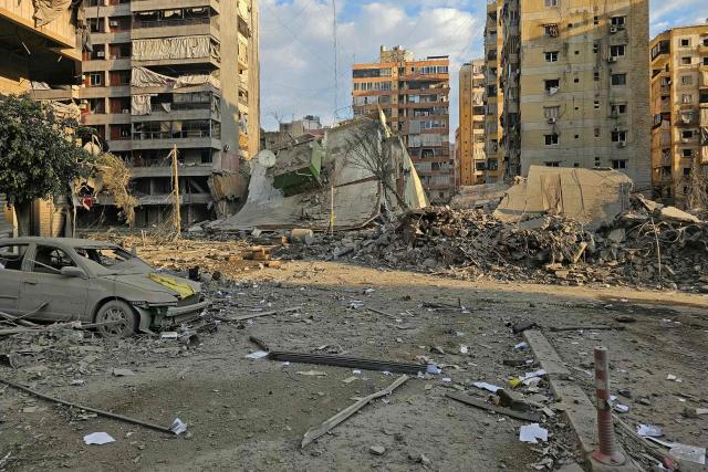 Rubble of destroyed buildings is seen at the site of an Israeli airstrike that targeted Haret Hreik neighbourhood in Beirut's southern suburbs, on March 7, 2026. Lebanese official media reported on March 7 that clashes had erupted as Israeli forces attempted a landing operation along the Lebanon-Syria border, with militant group Hezbollah saying its fighters were involved. There was no immediate comment from the Israeli military, which has launched numerous strikes and sent ground troops into Lebanon since Tehran-backed group Hezbollah fired missiles at Israel on March 2 to avenge the killing of Iranian supreme leader Ali Khamenei. (Photo by AFP)