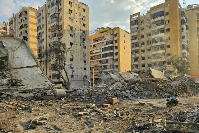 Rubble of destroyed buildings is seen at the site of an Israeli airstrike that targeted Haret Hreik neighbourhood in Beirut's southern suburbs, on March 7, 2026. Lebanese official media reported on March 7 that clashes had erupted as Israeli forces attempted a landing operation along the Lebanon-Syria border, with militant group Hezbollah saying its fighters were involved. There was no immediate comment from the Israeli military, which has launched numerous strikes and sent ground troops into Lebanon since Tehran-backed group Hezbollah fired missiles at Israel on March 2 to avenge the killing of Iranian supreme leader Ali Khamenei. (Photo by AFP)
