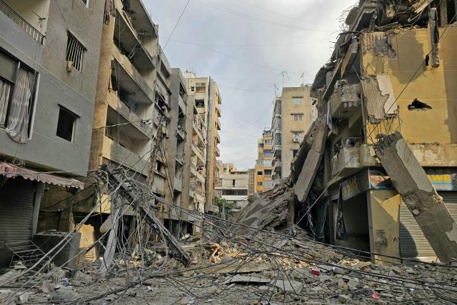 Rubble of destroyed buildings is seen at the site of an Israeli airstrike that targeted Haret Hreik neighbourhood in Beirut's southern suburbs, on March 7, 2026. Lebanese official media reported on March 7 that clashes had erupted as Israeli forces attempted a landing operation along the Lebanon-Syria border, with militant group Hezbollah saying its fighters were involved. There was no immediate comment from the Israeli military, which has launched numerous strikes and sent ground troops into Lebanon since Tehran-backed group Hezbollah fired missiles at Israel on March 2 to avenge the killing of Iranian supreme leader Ali Khamenei. (Photo by AFP)