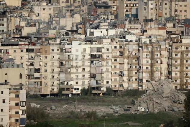 Damaged buildings are seen after Israeli airstrikes that targeted a neighbourhood in Beirut's southern suburbs, on March 7, 2026. Lebanese official media reported on March 7 that clashes had erupted as Israeli forces attempted a landing operation along the Lebanon-Syria border, with militant group Hezbollah saying its fighters were involved. There was no immediate comment from the Israeli military, which has launched numerous strikes and sent ground troops into Lebanon since Tehran-backed group Hezbollah fired missiles at Israel on March 2 to avenge the killing of Iranian supreme leader Ali Khamenei. (Photo by Ibrahim AMRO / AFP)