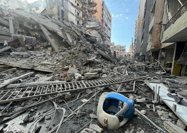 Rubble of destroyed buildings is seen at the site of an Israeli airstrike that targeted Haret Hreik neighbourhood in Beirut's southern suburbs, on March 7, 2026. Lebanese official media reported on March 7 that clashes had erupted as Israeli forces attempted a landing operation along the Lebanon-Syria border, with militant group Hezbollah saying its fighters were involved. There was no immediate comment from the Israeli military, which has launched numerous strikes and sent ground troops into Lebanon since Tehran-backed group Hezbollah fired missiles at Israel on March 2 to avenge the killing of Iranian supreme leader Ali Khamenei. (Photo by AFP)