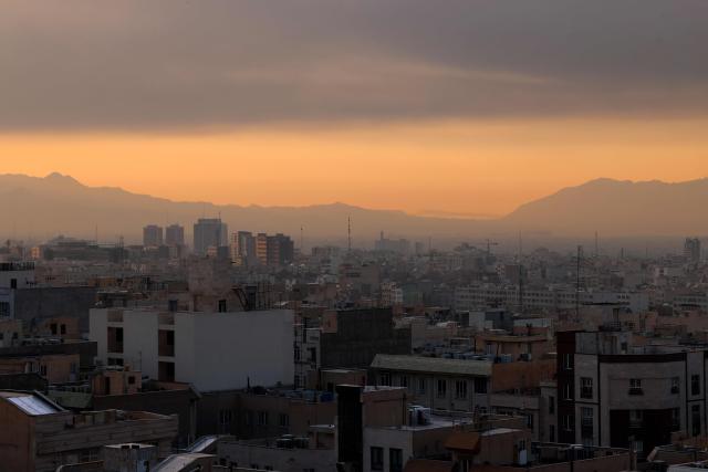 A general view of city's skyline is pictured during the morning in Tehran on March 7, 2026. Loud explosions struck the Iranian capital on March 7, state TV reported, as the war with Israel and the United States entered its second week. (Photo by ATTA KENARE / AFP)