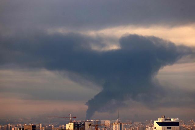 Smoke rises from the site of airstrikes in Tehran on March 7, 2026. Loud explosions struck the Iranian capital on March 7, state TV reported, as the war with Israel and the United States entered its second week. (Photo by ATTA KENARE / AFP)