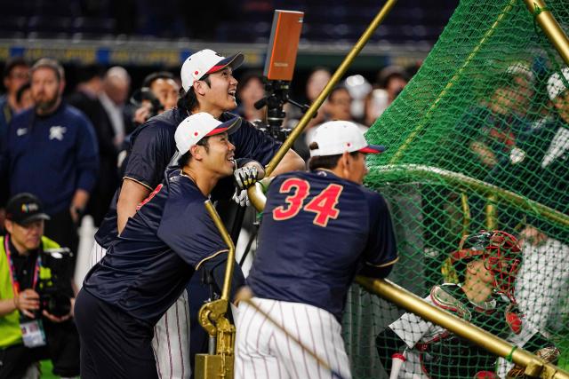 Japan's Shohei Ohtani warms up with teammates prior to the World Baseball Classic (WBC) Pool C game between Japan and South Korea at the Tokyo Dome in Tokyo on March 7, 2026. (Photo by Yuichi YAMAZAKI / AFP)