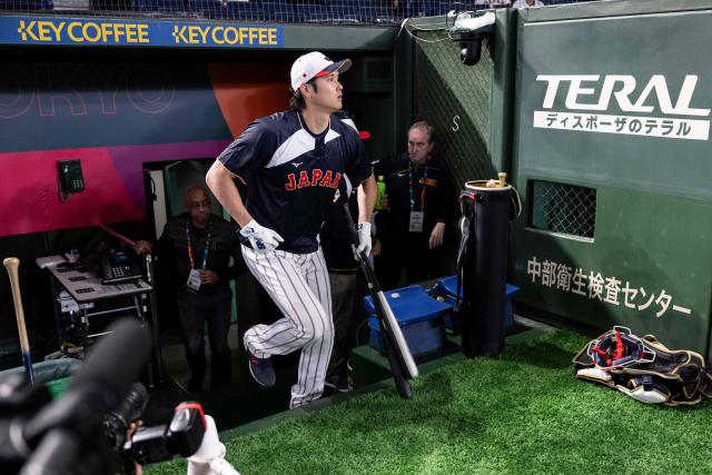 Japan's Shohei Ohtani arrives to warm up prior to the World Baseball Classic (WBC) Pool C game between Japan and South Korea at the Tokyo Dome in Tokyo on March 7, 2026. (Photo by Yuichi YAMAZAKI / AFP)