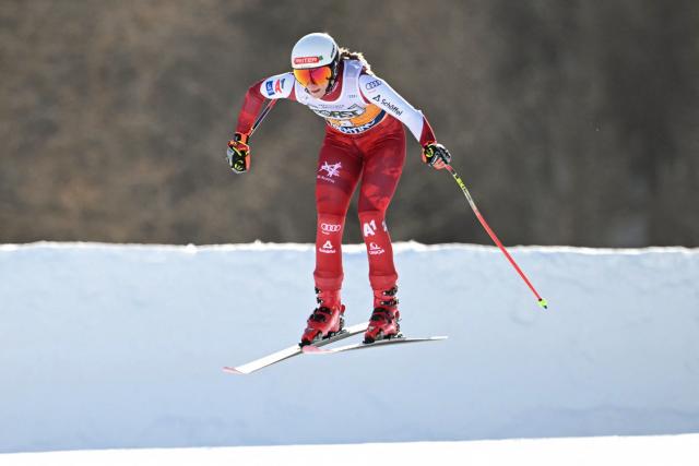 Austria's Mirjam Puchner competes in the Women's Downhill race of the FIS Ski World Cup at the La Volata slope in the Passo San Pellegrino ski area, Val di Fassa, Italy on March 7, 2026. (Photo by Andreas SOLARO / AFP)