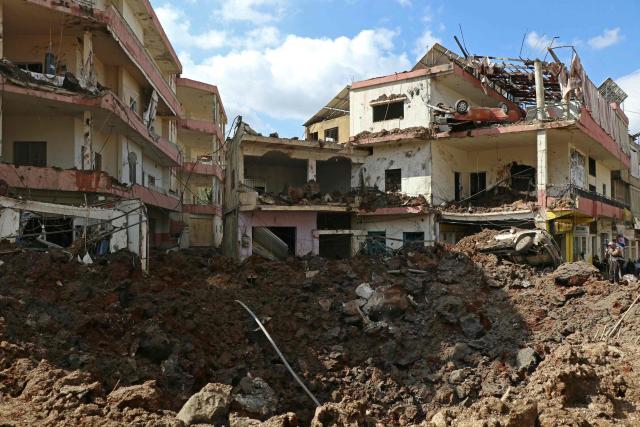 TOPSHOT - This photograph taken during a media tour organised by the Hezbollah shows destruction at Nabi Sheet town after an Israeli military operation in the Bekaa Valley of Lebanon, on March 7, 2026. Hezbollah on March 7 said it confronted Israeli troops that infiltrated an east Lebanon town overnight, with Lebanese authorities reporting at least 16 killed in Israeli strikes on the area. (Photo by Nidal SOLH / AFP)