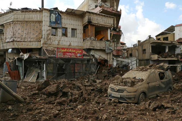 This photograph taken during a media tour organised by the Hezbollah shows destruction at Nabi Sheet town after an Israeli military operation in the Bekaa Valley of Lebanon, on March 7, 2026. Hezbollah on March 7 said it confronted Israeli troops that infiltrated an east Lebanon town overnight, with Lebanese authorities reporting at least 16 killed in Israeli strikes on the area. (Photo by Nidal SOLH / AFP)