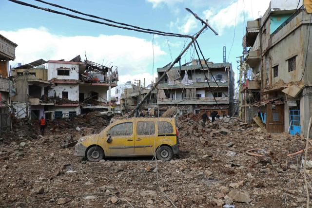 This photograph taken during a media tour organised by the Hezbollah shows destruction at Nabi Sheet town after an Israeli military operation in the Bekaa Valley of Lebanon, on March 7, 2026. Hezbollah on March 7 said it confronted Israeli troops that infiltrated an east Lebanon town overnight, with Lebanese authorities reporting at least 16 killed in Israeli strikes on the area. (Photo by Nidal SOLH / AFP)